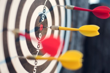 darts arrows in the target center. business target concept.