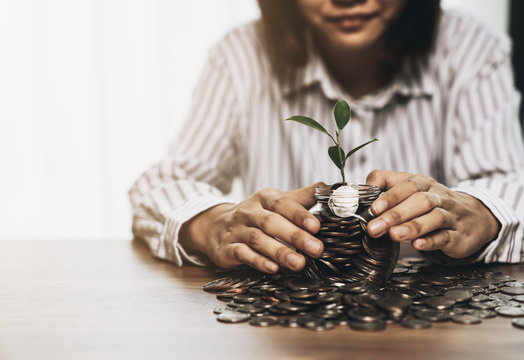 Person are holding a momey glass with save money for the future concept, saving money concept and finance accounting.