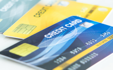 Stack of multicolored credit cards close-up
