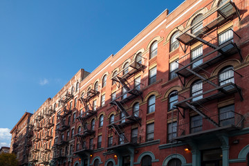 classic vintage new york city brick buildings with firescapes