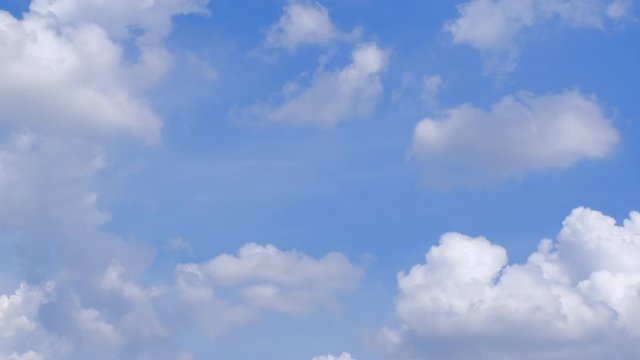 Stock 4k: Time lapse, timelapse video of clear blue sky white fluffy clouds. Royalty high-quality free stock time lapse footage of blue sky and white cloud. Time lapse of natural cloudscape background