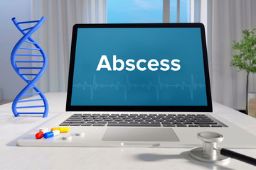 Abscess – Medicine/health. Computer in the office with term on the screen. Science/healthcare