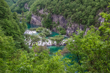 View from above of waterfall cascade with turquoise water in Plitvice Lakes National Park, Croatia