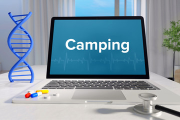 Camping – Medicine/health. Computer in the office with term on the screen. Science/healthcare