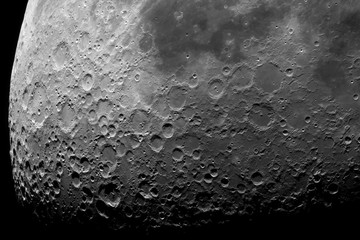 Fototapeta premium Photo of the moon with high magnification. Moon, view through a telescope. Moon with craters.