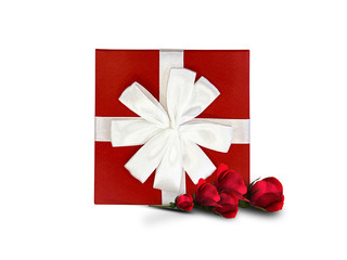 Gift, red box with a white ribbon on a white isolated background.