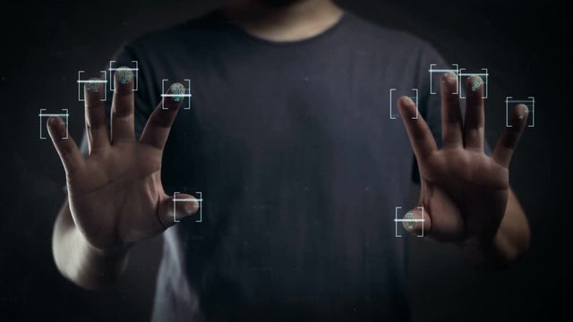 Man Scanning Ten Fingers to Digital Screen Revealing World Map Data. HUD Hologram
