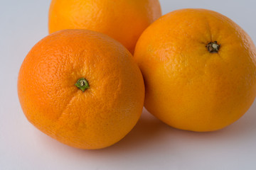 organic oranges isolated on white background