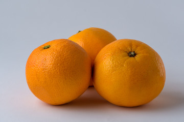 organic oranges isolated on white background