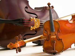 The violin is made from classic brown wood.