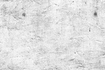 Fototapeta premium Texture of a concrete wall with cracks and scratches which can be used as a background