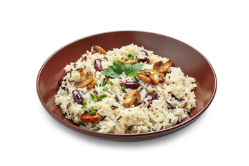 Delicious rice pilaf with mushrooms isolated on white