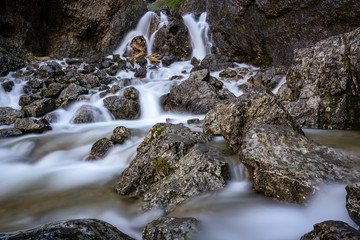 Slow shutter speed shot of Gordale Beck with Gordale Scar in the back ground Malham, Yorkshire Dales National Park.UK