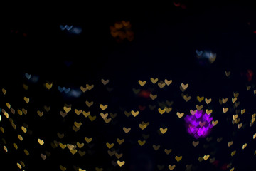 bokeh and blur abstract heart shape love valentine colorful night light on wall