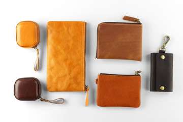 A collection of leather goods - obrazy, fototapety, plakaty
