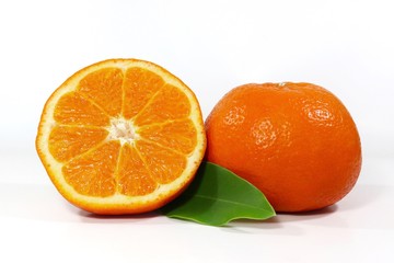 slice orange with leaf on white background  