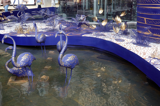 Bangkok, Thailand - December 21, 2019: Blue flamingos in Siam Paragon shopping mall.