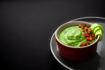 Healthy food on the menu with fresh green vegetables in the consistency of mashed soup