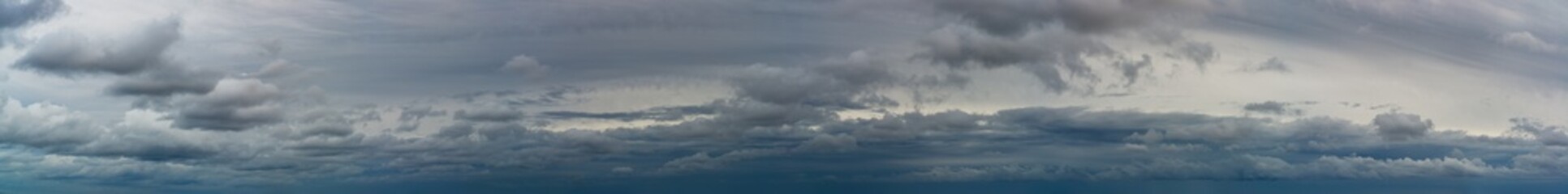 Naklejka na ściany i meble Fantastic dark thunderclouds, sky panorama