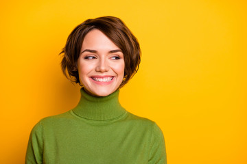 Closeup photo of short hairdo pretty lady charming smiling good mood looking side empty space sly...