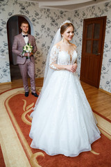 Fototapeta premium First meeting of the bride and groom on the wedding day