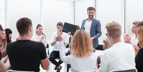 speaker talking about something at a business seminar