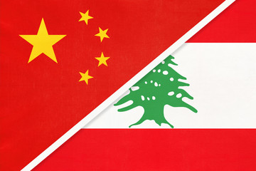 People's Republic of China or PRC vs Lebanon national flag from textile. Relationship between two asian countries.