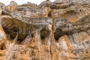 Limestone cliffs with caves