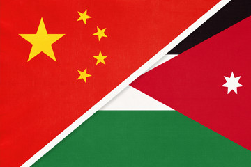 People's Republic of China or PRC vs Jordan national flag from textile. Relationship between two asian countries.