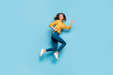 Fototapeta Full length body size profile side view of nice sportive cheerful wavy-haired girl jumping running fast life inspiration isolated on bright vivid shine vibrant green blue turquoise color background obraz