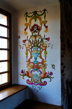 KORZKIEW, POLAND - OCT 11, 2019: Stained glass windows in Korzkiew castle, Poland, depicting Polish Queen Jadwiga and King Jagiello