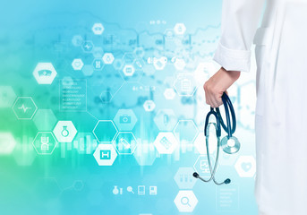 Hand of practitioner with stethoscope