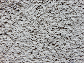 Facade plaster background. Grey structural background of wall plaster texture