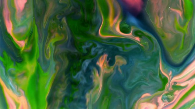 Marbling, multi-colored swirled, stone-like patterns. Paint floating, spreading on the surface of a liquid. Abstract fluid art, ink in motion. Magical marble texture. Ink bloom, blast, paint explosion