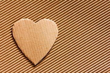 Valentine card for Valentine's day cardboard heart on cardboard background with copy space, Close-up, top view