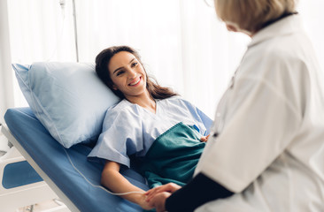 Obraz premium Female doctor discussing and consulting with woman patien in hospital.healthcare and medicine