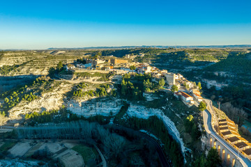 Obraz premium Aerial panoramic view of Jorquera town and castle above the Jucar river bend in Albacete province Spain