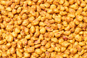 crispy coated masala peanut texture background, top view