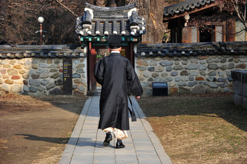 A confucian scholar is walking in korean traditional clothing at Jeonju Hyanggyo in Jeonju, South...