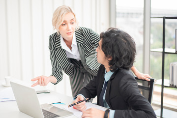 Business people are analyzing financial report