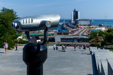 A binocular for tourists pointing out to the seashore