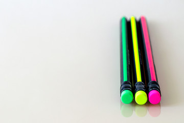 Erasers of multi-colored pencils. Smooth blur. Acid colors