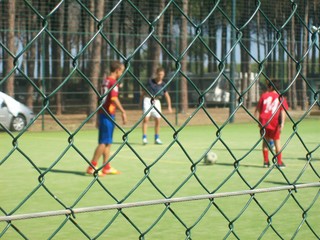 Obraz premium kids playing soccer