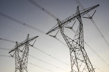 two australian high voltage power lines at dusk