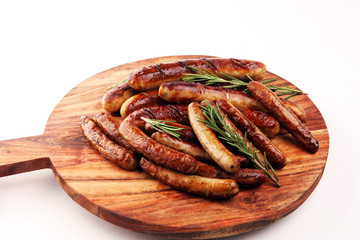 Grilled sausages with spices on a table - Home-made Pork Sausages.