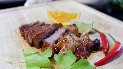grilled beef steak with vegetables on white plate