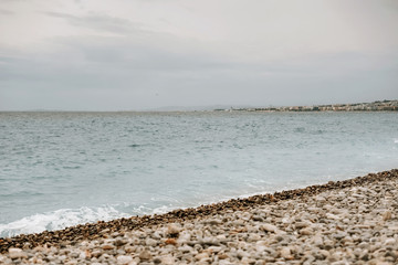 Nice, France September 2019. Panoramic view of Nice coastline and beach with blue sky, France. Cloudy day in Nice.