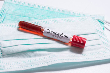 Blood test tube with positive Wuhan coronavirus