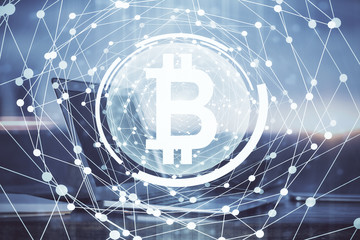 Double exposure of blockchain theme hologram and table with computer background. Concept of bitcoin...