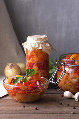 pepper, carrot and tomato salad in a glass jar